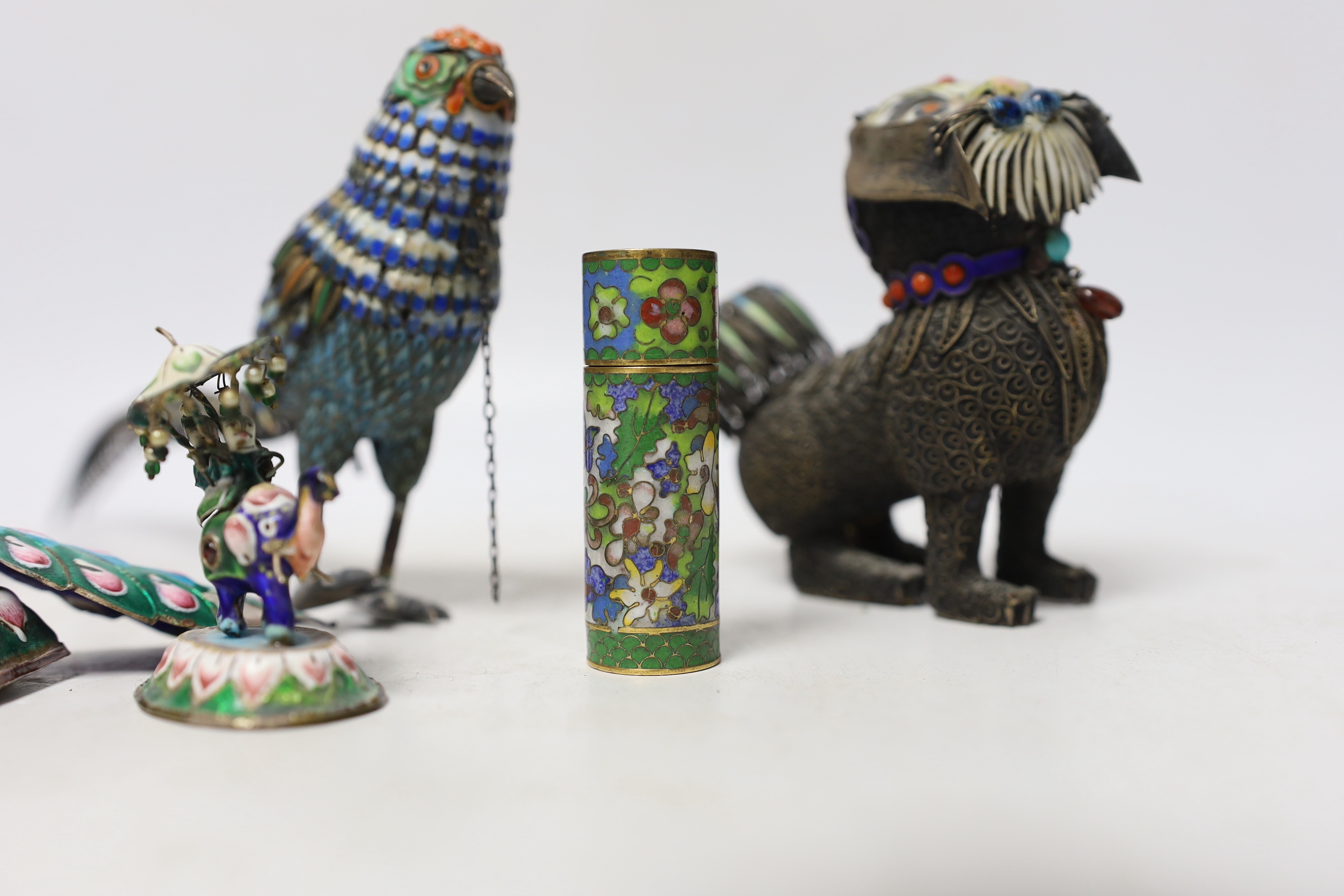 A Chinese white metal enamel pheasant, two similar lions, a cloisonné enamel pot and two Indian enamel figures